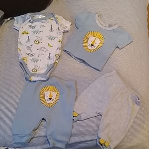 Two matching baby outfits